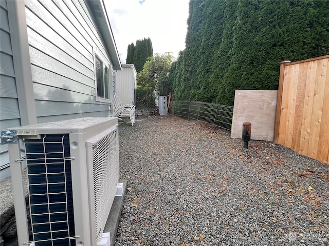 view of yard with ac unit