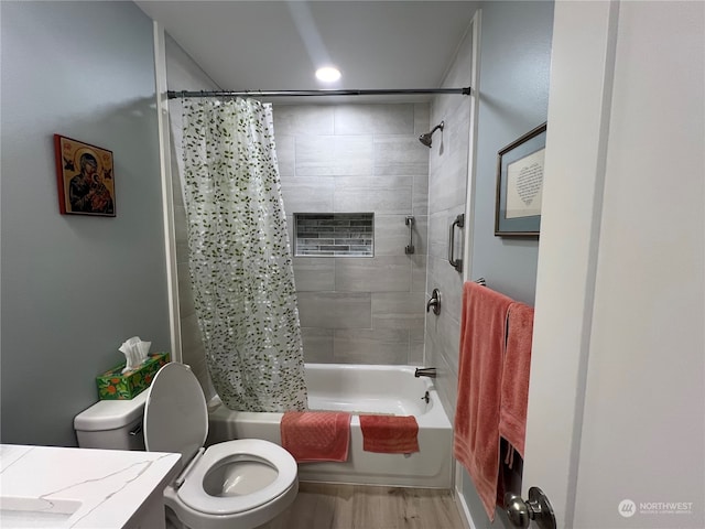 full bathroom with vanity, toilet, wood-type flooring, and shower / bath combo