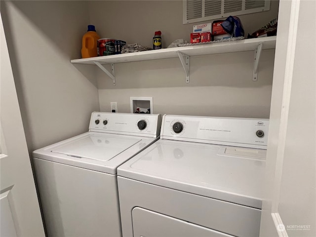 laundry area featuring washing machine and dryer