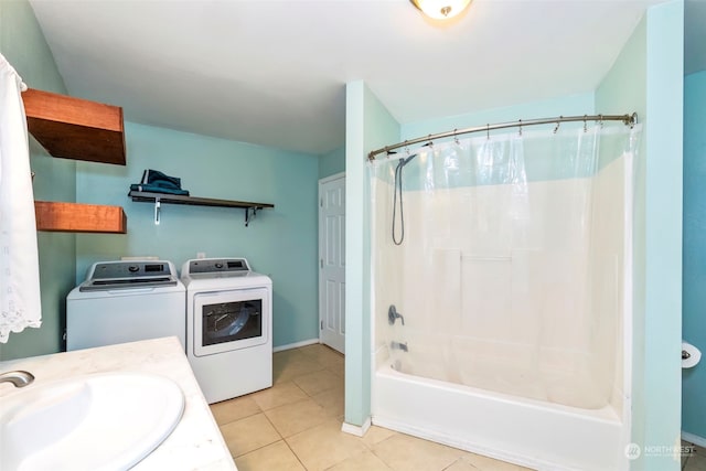 bathroom with tile patterned floors, separate washer and dryer, vanity, and shower / bath combo