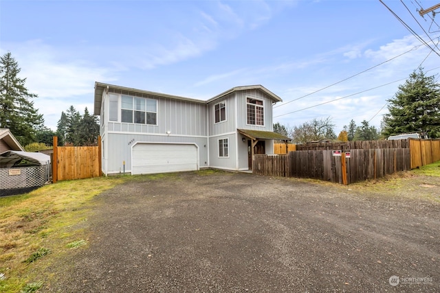 view of property with a garage