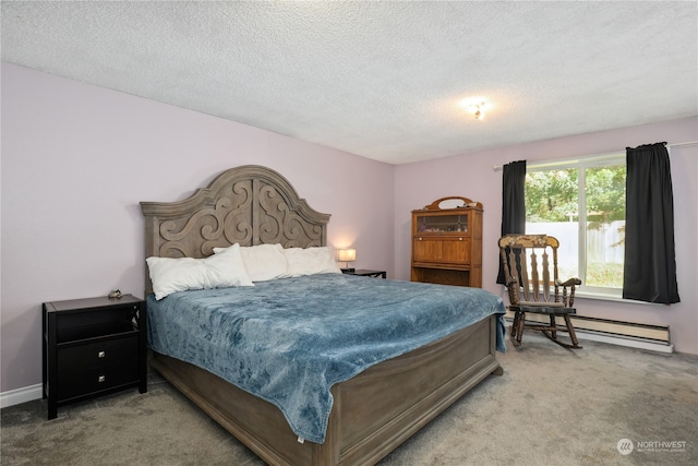 bedroom with carpet floors, a textured ceiling, and a baseboard radiator