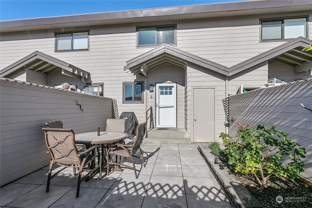 rear view of property with a patio