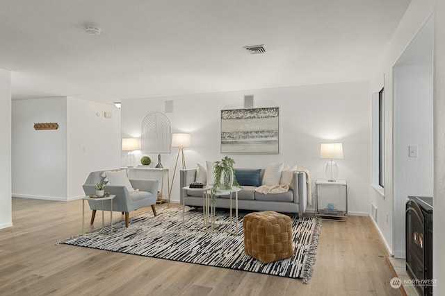 living room featuring light hardwood / wood-style flooring