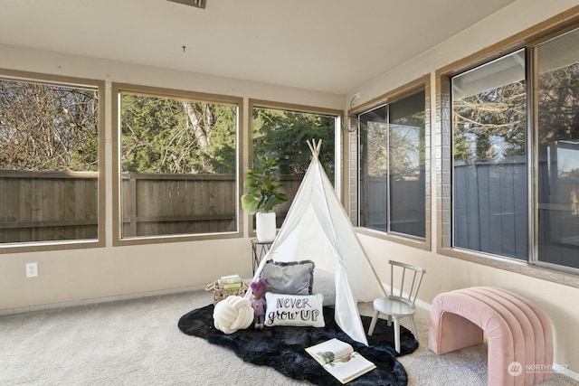 sunroom / solarium with a healthy amount of sunlight