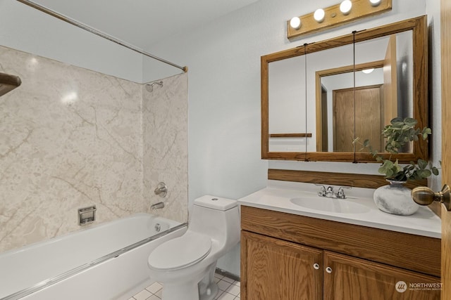 full bathroom featuring tile patterned flooring, tiled shower / bath, vanity, and toilet