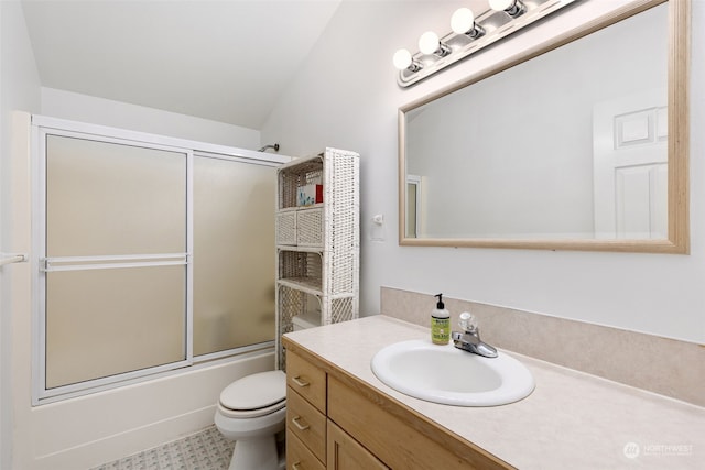 full bathroom featuring vanity, toilet, combined bath / shower with glass door, and lofted ceiling