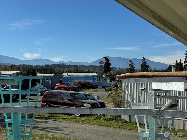 view of dock featuring a mountain view