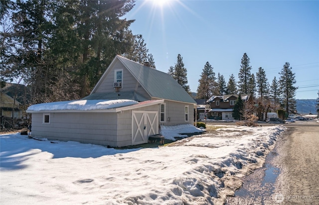 view of front of property with an outbuilding and a barn