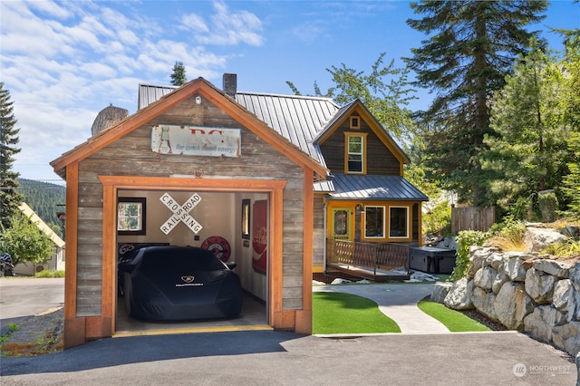 view of front facade with a carport