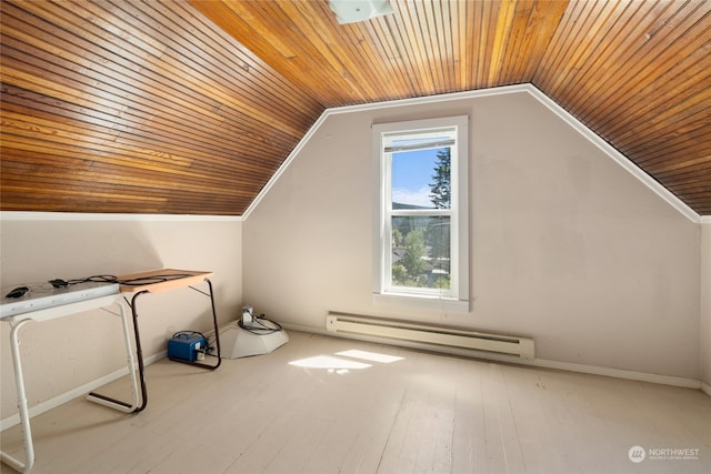 bonus room with baseboard heating, vaulted ceiling, and wooden ceiling