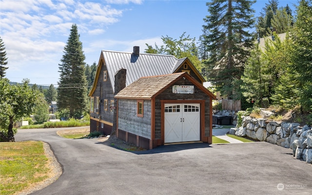 exterior space featuring a garage