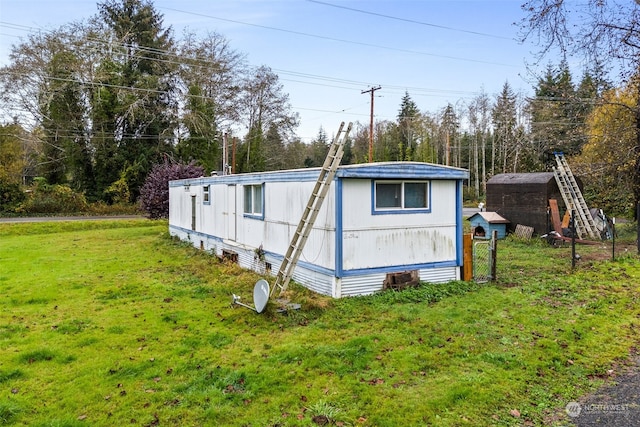 view of outdoor structure featuring a yard