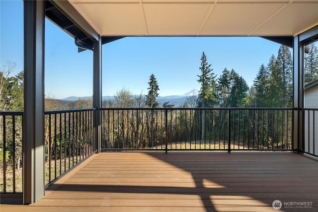 wooden terrace featuring a mountain view