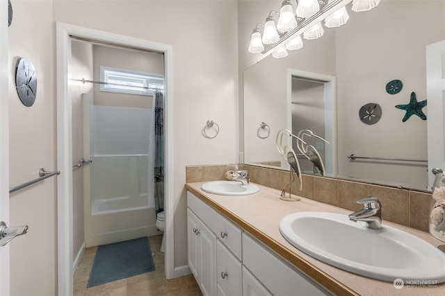 full bathroom with toilet, vanity, shower / bathtub combination with curtain, and tile patterned floors