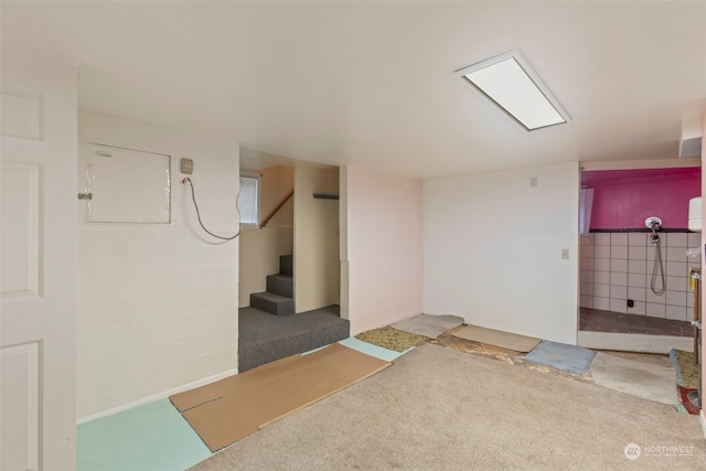 basement with carpet flooring