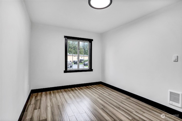 empty room featuring light hardwood / wood-style floors