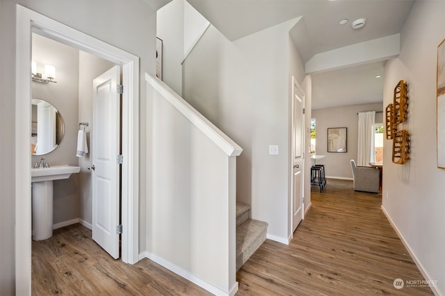 hallway featuring hardwood / wood-style flooring