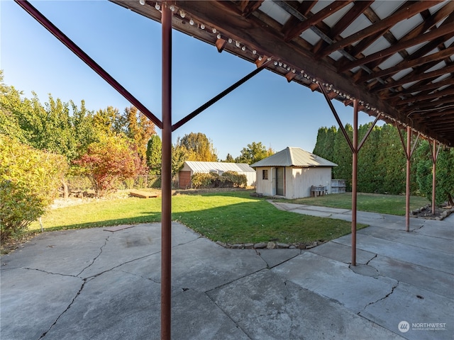 view of patio with an outdoor structure