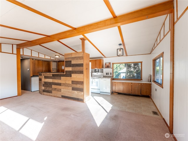 kitchen with lofted ceiling with beams, light carpet, and white appliances