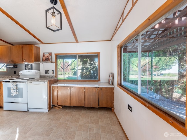 kitchen featuring pendant lighting and white appliances