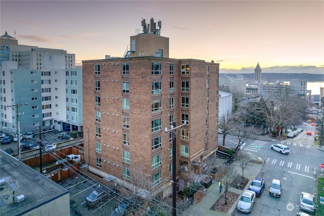 view of outdoor building at dusk