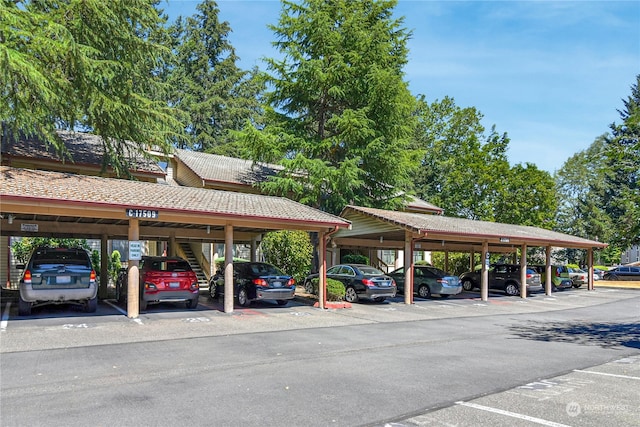 view of parking / parking lot featuring a carport