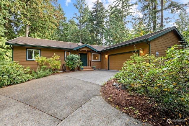 single story home featuring a garage