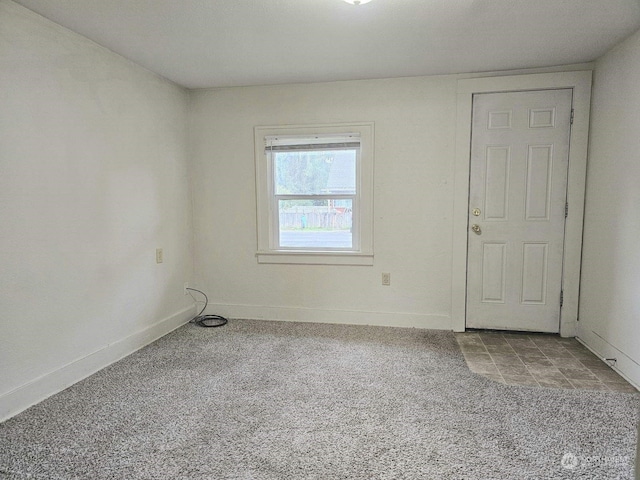 view of carpeted spare room