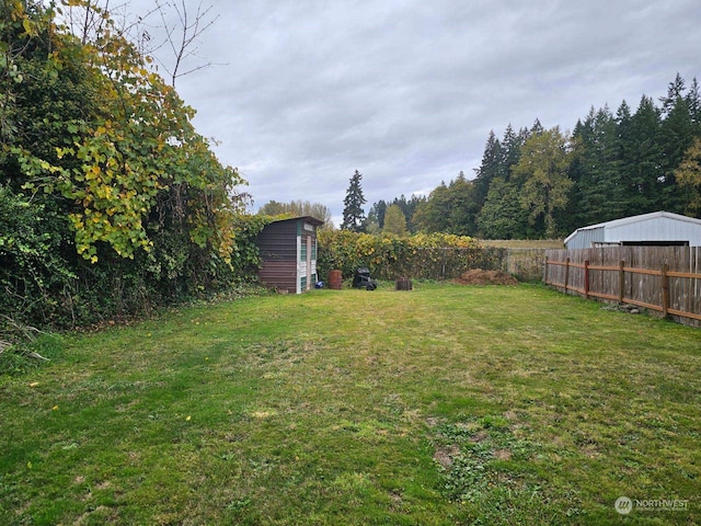 137 Williams Ave, Kelso, WA 98626 - view of yard with fence, an outbuilding, and a shed