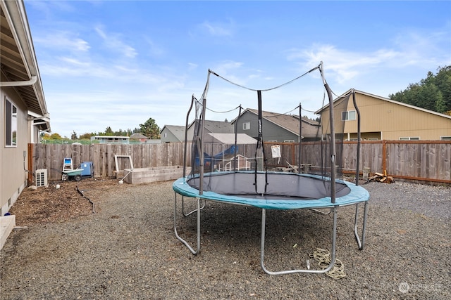 view of play area with a trampoline