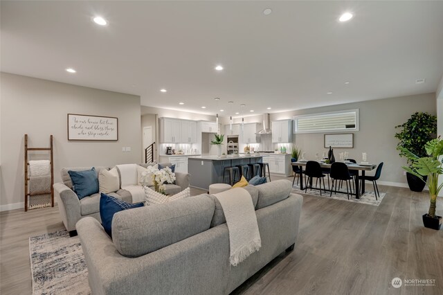 living room with light hardwood / wood-style floors