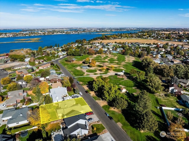 drone / aerial view with a water view