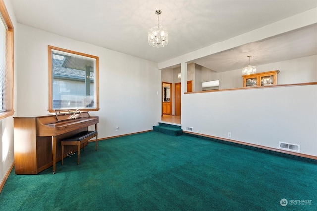 unfurnished room featuring an inviting chandelier and dark colored carpet