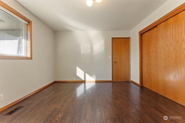 interior space with dark wood-type flooring