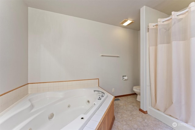 bathroom featuring tile patterned flooring, toilet, and separate shower and tub