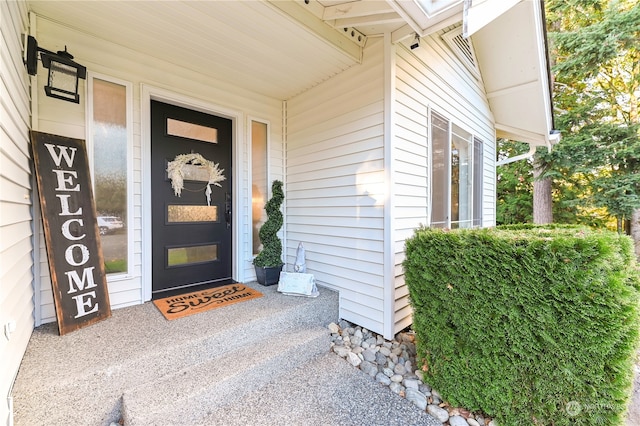 entrance to property with a porch