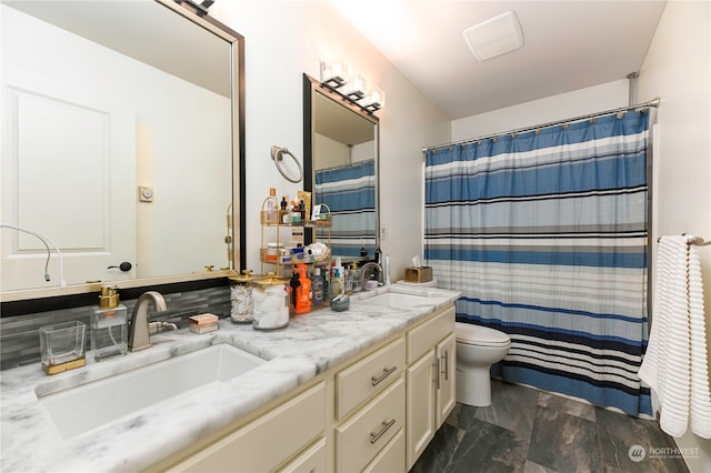 bathroom with walk in shower, vanity, toilet, and decorative backsplash