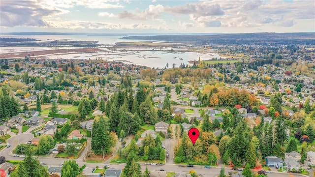 birds eye view of property featuring a water view