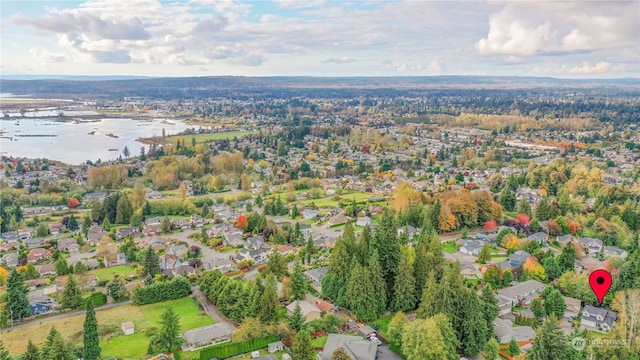 bird's eye view with a water view