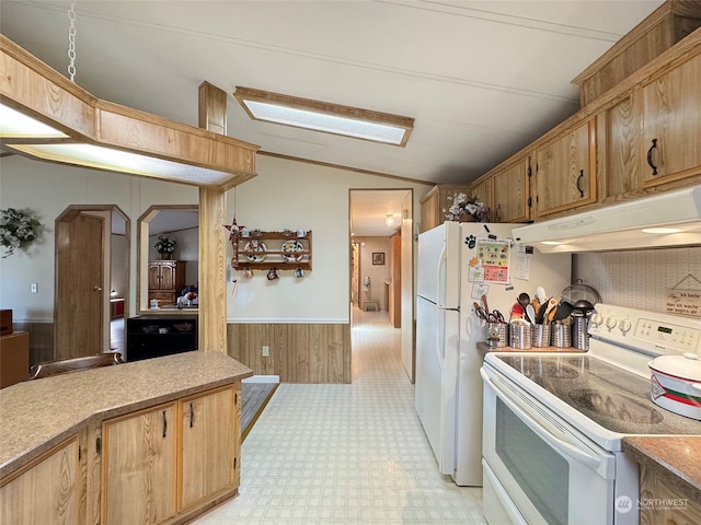 kitchen with electric stove, vaulted ceiling, and wooden walls