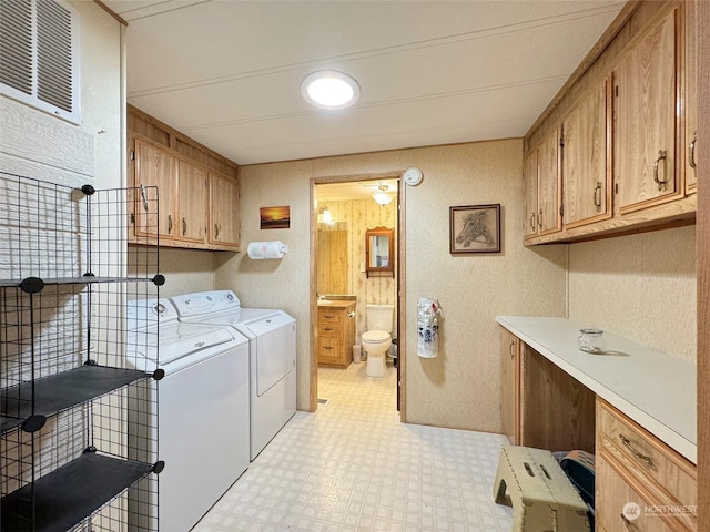 121 Fircrest Dr, Sequim, WA 98382 - clothes washing area featuring cabinet space, visible vents, washer and dryer, and light floors