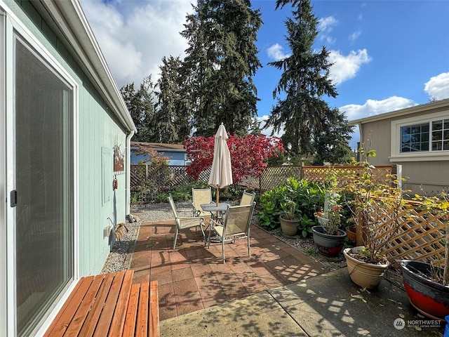 121 Fircrest Dr, Sequim, WA 98382 - view of patio featuring a fenced backyard and outdoor dining space