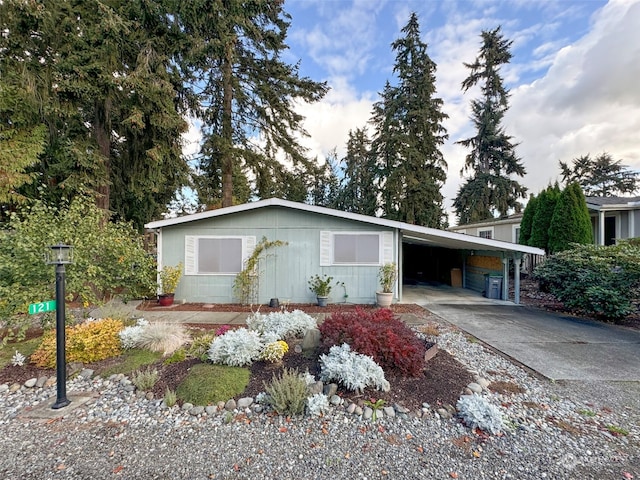 view of front of house featuring a carport