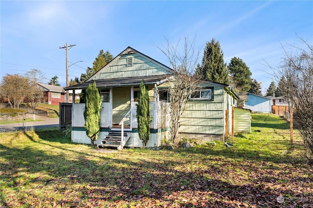 view of front of home with a front yard