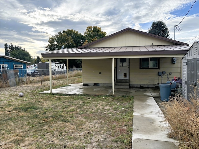 bungalow-style home featuring a carport