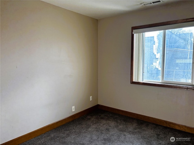 view of carpeted spare room