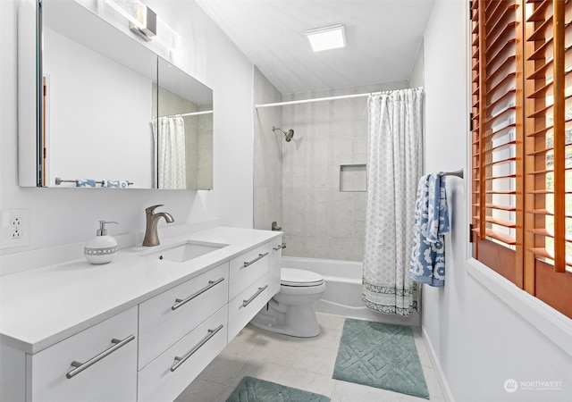 full bathroom with vanity, shower / bath combo, and toilet