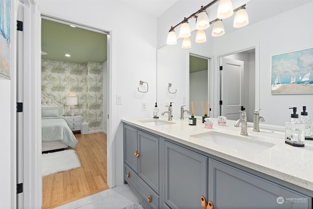 bathroom featuring vanity and wood-type flooring