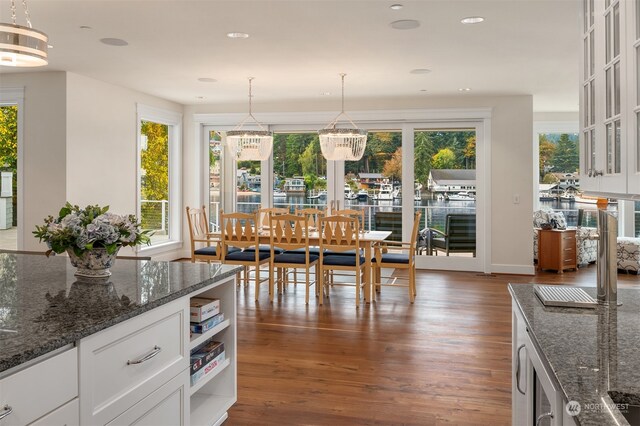 dining area featuring dark hardwood / wood-style flooring